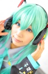 aqua_hair cosplay default_costume detached_sleeves hatsune_miku headset tenko tie twintails vocaloid rating:Safe score:0 user:nil!