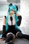 aqua_hair cosplay detached_sleeves hairbows hatsune_miku headset jumper project_diva ryuga thighhighs twintails vocaloid zettai_ryouiki rating:Safe score:1 user:nil!