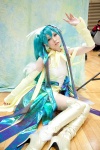 aqua_hair boots cosplay detached_sleeves dress hatsune_miku headdress jiruko twintails vocaloid rating:Safe score:0 user:pixymisa