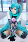 aida_yukiko aqua_hair boots cosplay croptop elbow_gloves gloves hatsune_miku headset pantyhose project_diva shorts sleeveless thigh_boots thighhighs twintails vocaloid rating:Safe score:3 user:pixymisa