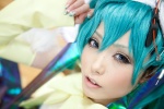 aqua_hair cosplay detached_sleeves dress hatsune_miku headdress jiruko twintails vocaloid rating:Safe score:2 user:pixymisa