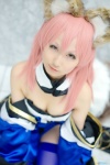 animal_ears caster cleavage cosplay detached_sleeves dress fate/extra fate/series fox_ears fox_tail pink_hair seri thighhighs rating:Safe score:0 user:pixymisa