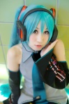 blouse cosplay detached_sleeves hatsune_miku headset pleated_skirt skirt tie twintails vocaloid yuki_nano rating:Safe score:0 user:nil!