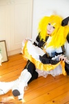 blonde_hair boots cosplay detached_sleeves dress dress_lift hairbow kagamine_rin leggings meltdown_(vocaloid) saku scene_ever_4 twintails vocaloid rating:Safe score:0 user:nil!