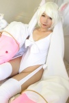 animal_ears bed cleavage cosplay elbow_gloves fingerless_gloves garter_straps gloves higurashi_rin kyuubee one-piece_swimsuit puella_magi_madoka_magica stuffed_animal swimsuit thighhighs white_hair rating:Safe score:5 user:nil!