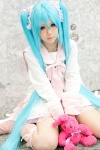 aqua_hair bow cosplay dress hatsune_miku kneesocks lots_of_laugh_(vocaloid) plushie rushi twintails vocaloid rating:Safe score:1 user:pixymisa