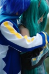 aqua_hair blue_hair cosplay crossplay default_costume detached_sleeves hatsune_miku jacket kaito kuroha scarf tie twintails vocaloid yukiko rating:Safe score:0 user:nil!