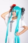 aqua_hair cosplay dress hairbows hatsune_miku natsu_yuki twintails vocaloid rating:Safe score:0 user:pixymisa