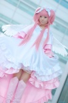 boots cosplay dress gloves hairbows kaname_madoka mumuko petticoat pink_eyes pink_hair puella_magi_madoka_magica shawl tiered_skirt twintails wings rating:Safe score:1 user:pixymisa