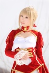 blonde_hair braid cleavage cosplay dress fate/series fate/stay_night kamui_arisa red_moon saber rating:Safe score:0 user:nil!