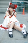 blouse cosplay detached_sleeves hairbow hakurei_reimu kishigami_hana miko skirt socks touhou rating:Safe score:2 user:nil!