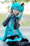 aice aqua_hair cosplay default_costume detached_sleeves hatsune_miku headset pleated_skirt skirt thighhighs tie twintails vocaloid rating:Safe score:0 user:nil!