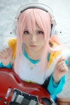 boots cosplay guitar harumiya_yun headphones necklace nitro_super_sonic pink_hair super_soniko track_jacket tshirt rating:Safe score:0 user:pixymisa