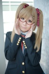 bechiko blazer blonde_hair blouse cosplay glasses green_eyes hair_ribbons looking_over_glasses nyotalia striped tie twintails united_kingdom rating:Safe score:1 user:pixymisa