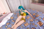 aqua_hair bed bikini_top cosplay horns kirihara_mizui lum shorts swimsuit tiger_print urusei_yatsura rating:Safe score:1 user:nil!