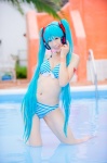 aqua_hair bikini cleavage cosplay hatsune_miku headset mashiro_yuki pool project_diva swimsuit twintails vocaloid wet rating:Safe score:1 user:nil!