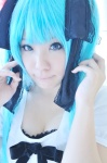 aqua_hair blouse bra cleavage cosplay hair_ribbons hatsune_miku irori twintails vocaloid world_is_mine_(vocaloid) rating:Safe score:1 user:nil!