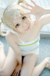 blonde_hair cosplay hairbow hair_clips headphones kagamine_rin one-piece_swimsuit project_diva swimsuit vocaloid yuyu_kaname rating:Safe score:0 user:nil!