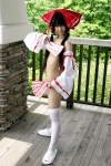 cosplay detached_sleeves hairbow hakurei_reimu lenfried miko nude thighhighs touhou underboob rating:Questionable score:5 user:nil!
