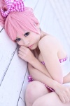 cosplay dai hairbow megurine_luka pink_hair pleated_skirt ponytail skirt tubetop vocaloid rating:Safe score:0 user:pixymisa