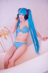 aqua_hair bathroom bathtub bikini cleavage cosplay hatsune_miku headset mashiro_yuki project_diva swimsuit twintails vocaloid rating:Safe score:0 user:nil!