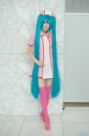aqua_hair cosplay dress hatsune_miku koiiro_byoutou_(vocaloid) nurse nurse_cap nurse_uniform tatsuki_(ii) thighhighs twintails vocaloid zettai_ryouiki rating:Safe score:2 user:nil!