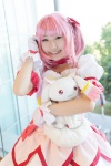 bows choker cosplay dress gloves hairbow kaname_madoka kujyou_konegi pink_hair plushie puella_magi_madoka_magica red_eyes tiered_skirt twintails rating:Safe score:0 user:pixymisa