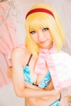 alice_margatroid bikini blonde_hair capelet cleavage cosplay hairband mike swimsuit touhou rating:Safe score:2 user:nil!