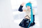 aqua_hair cosplay croptop detached_sleeves hairbow hatsune_miku mashiro_yuki pleated_skirt ponytail project_diva skirt thighhighs vocaloid zettai_ryouiki rating:Safe score:0 user:nil!