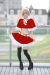 black_legwear blonde_hair capelet cosplay halter_top maitako miniskirt original santa_costume skirt skirt_lift stocking_cap thighhighs zettai_ryouiki rating:Safe score:2 user:nil!