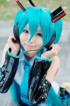 aice aqua_hair cosplay default_costume detached_sleeves hatsune_miku headset pleated_skirt skirt thighhighs tie twintails vocaloid rating:Safe score:1 user:nil!