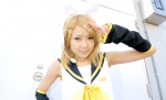 blonde_hair cosplay default_costume detached_sleeves hairbow hair_clips headset hiromichi kagamine_rin sailor_uniform school_uniform shorts vocaloid rating:Safe score:0 user:nil!