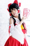 blouse cosplay detached_sleeves hairbow hakurei_reimu miko satori skirt touhou rating:Safe score:2 user:pixymisa