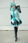 aqua_hair blouse chacha cosplay default_costume detached_sleeves hatsune_miku headset pleated_skirt skirt thighhighs tie twintails vocaloid zettai_ryouiki rating:Safe score:0 user:nil!