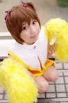 cardcaptor_sakura cheerleader cosplay hair_ribbons kinomoto_sakura pom_poms zero_inch rating:Safe score:0 user:nil!