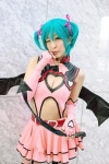 aqua_hair chii cleavage cosplay dress elbow_gloves fingerless_gloves gloves hairbows hatsune_miku project_diva stirrup_socks tail twintails vocaloid world_is_mine_(vocaloid) rating:Safe score:1 user:nil!
