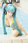 aqua_hair bikini cleavage cosplay hatsune_miku headset mashiro_yuki pool project_diva swimsuit twintails vocaloid wet rating:Safe score:13 user:nil!