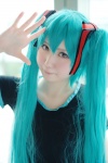 aqua_hair cosplay hatsune_miku tagme_song tshirt twintails uu vocaloid rating:Safe score:0 user:nil!