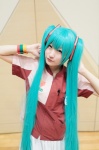 aqua_hair blouse cosplay hatsune_miku mera pleated_skirt skirt twintails vocaloid wristband rating:Safe score:0 user:pixymisa