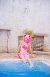 bikini_top cosplay hair_ribbons kaname_madoka mashiro_yuki miniskirt pink_hair pool puella_magi_madoka_magica skirt swimsuit twintails wet rating:Safe score:0 user:nil!