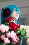 aqua_hair cosplay hatsune_miku headset tachibana_sakura twintails vocaloid rating:Safe score:1 user:pixymisa