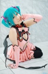 aqua_hair chii cleavage cosplay dress elbow_gloves fingerless_gloves garter_belt gloves hairbows hatsune_miku project_diva stirrup_socks tail twintails vocaloid wings world_is_mine_(vocaloid) rating:Safe score:2 user:nil!