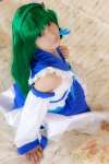 bed cosplay croptop detached_sleeves green_hair kochiya_sanae lenfried miniskirt skirt touhou rating:Safe score:0 user:nil!