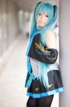 aqua_hair blouse cosplay detached_sleeves hatsune_miku headset pleated_skirt sanaka skirt thighhighs tie twintails vocaloid rating:Safe score:0 user:pixymisa