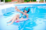 aqua_hair bikini cosplay hatsune_miku headset inner_tube mashiro_yuki pool project_diva swimsuit twintails vocaloid wet rating:Safe score:0 user:nil!