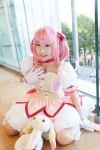 bows choker cosplay dress gloves hairbow kaname_madoka kneehighs kujyou_konegi pink_hair plushie puella_magi_madoka_magica red_eyes tiered_skirt twintails rating:Safe score:0 user:pixymisa