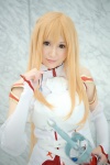 asuna_(sao) blonde_hair blouse caramel_eyes chest_armor cosplay detached_sleeves necklace pleated_skirt skirt sword sword_art_online thighhighs wakame zettai_ryouiki rating:Safe score:1 user:pixymisa