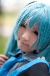 aqua_hair blouse cosplay detached_sleeves hatsune_miku headset sanaka tie twintails vocaloid rating:Safe score:0 user:pixymisa