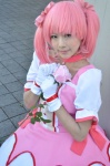 choker cosplay dress flower gloves hairbows kaname_madoka mizushiro_miyabi pink_eyes pink_hair puella_magi_madoka_magica twintails rating:Safe score:0 user:pixymisa