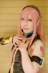 cosplay default_costume headset mai megurine_luka pink_hair skirt sleeveless_blouse vocaloid rating:Safe score:0 user:nil!